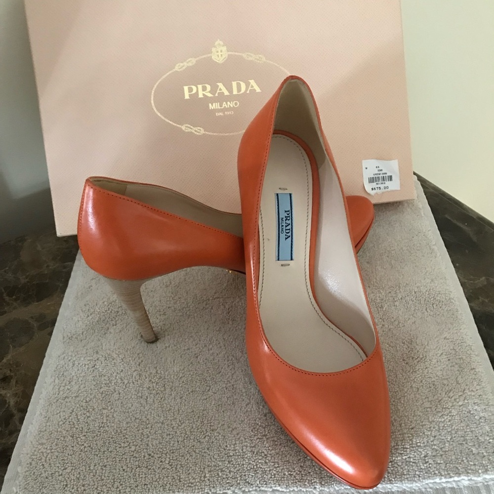 Prada orange leather pumps